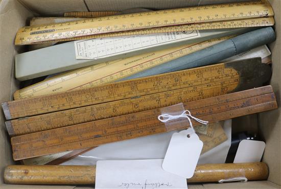 An Edward Roberts boxwood four-slide rule, a vintage rolling ruler with HMSO stamp to end, sundry draughtsmans instruments, etc